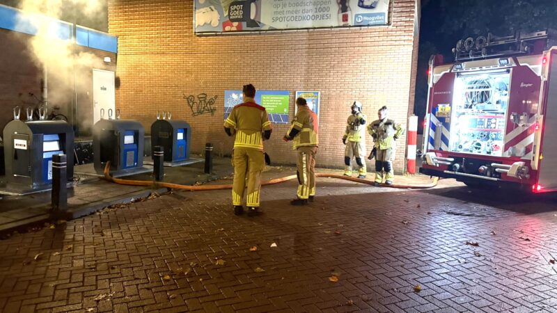 Inhoud papiercontainer in brand